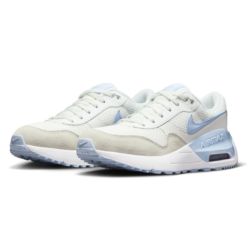 Nike Air Max SYSTM sneakers, side view with white uppers and light-blue panels