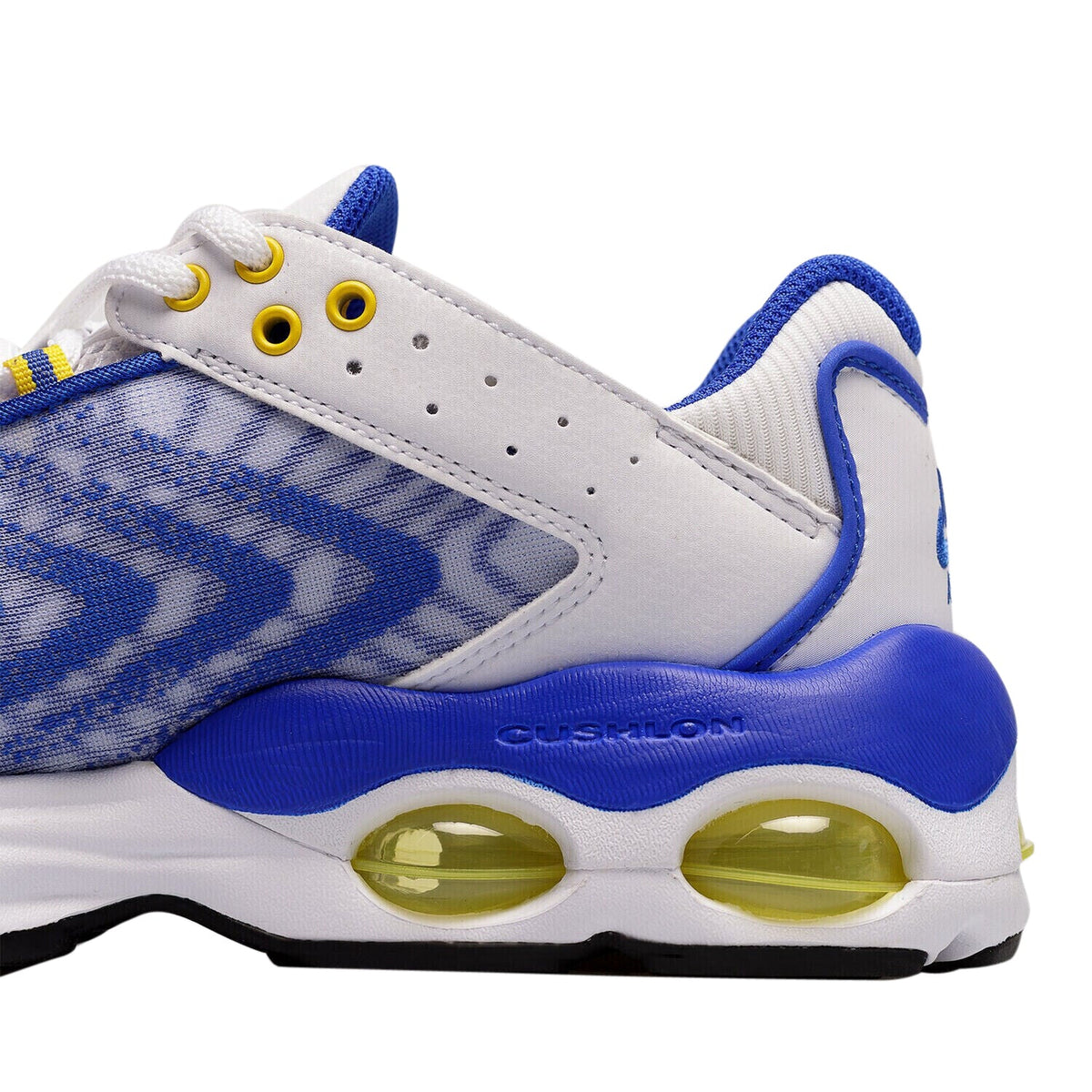 Kids' Nike Air Max TW sneakers, toe close-up; white leather with blue pattern and yellow