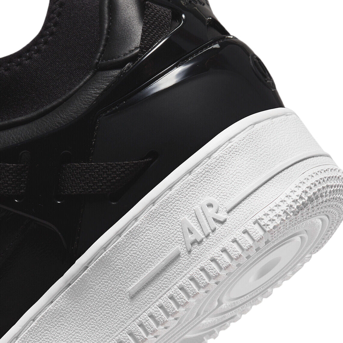Men's Nike Air Force 1 Low SP sneakers, close-up of black side panel and white sole