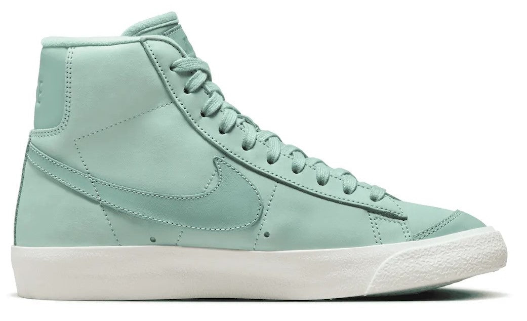 Mint Nike high-top sneaker with lace-up front and side swoosh