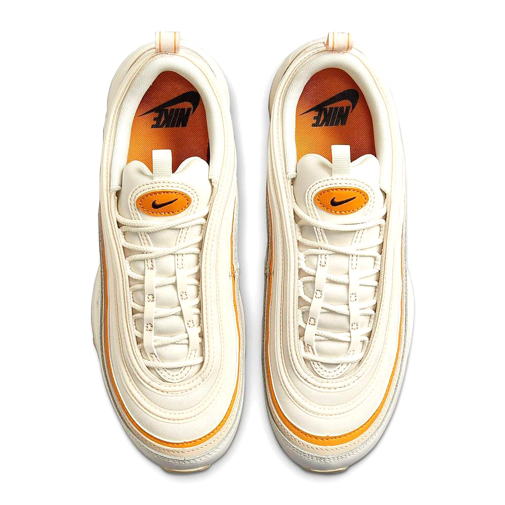 Women's Nike Air Max 97 lace and tongue view, cream with orange Swoosh and trim