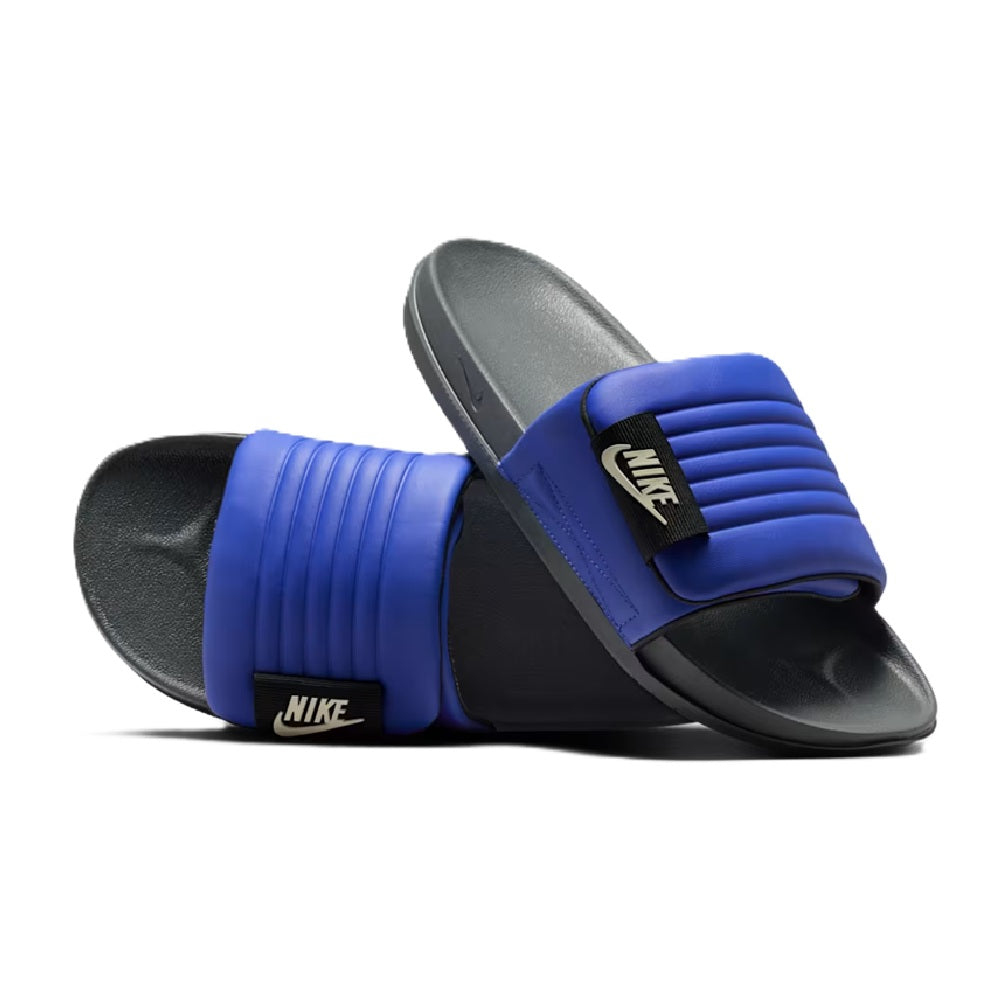 Men’s slide sandals pair, blue strap with Nike branding over black base