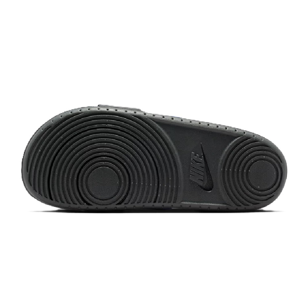 Sandal outsole with circular tread pattern and Nike logo, dark gray/black