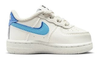 Toddler low-top sneakers, white with light blue Nike Swoosh and lace-up design