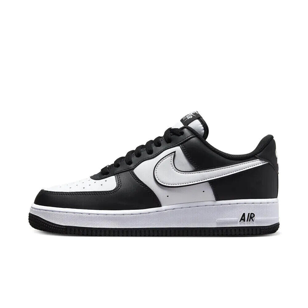 Nike Air Force 1 '07 sneakers in black and white, side view with swoosh