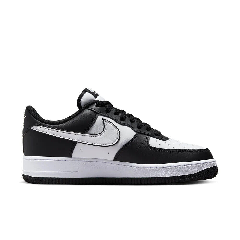Nike Air Force 1 '07 sneakers in black and white, angled side view