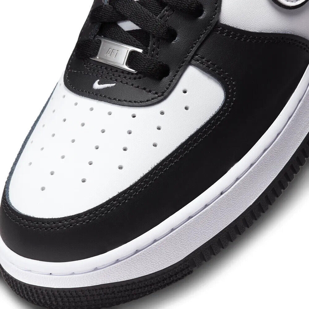 Nike Air Force 1 '07 sneakers close-up of laces and perforated toe