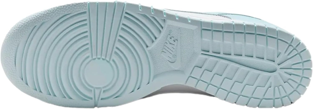 Nike Dunk Low retro sneaker outsole view, textured rubber in light blue