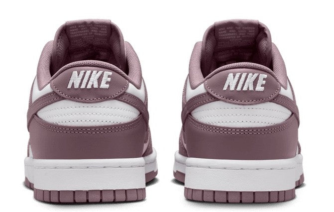 Men's Nike Dunk Low retro sneakers, heel view with NIKE branding and taupe uppers