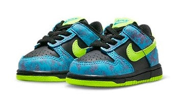 Pair of toddler low-top sneakers with blue patterned uppers and neon green accents