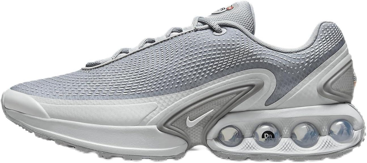 Men's Nike Air Max DN sneaker in wolf grey with silver accents, lace-up front