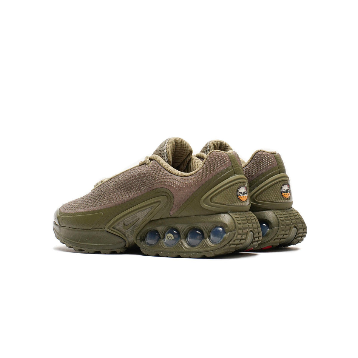 Nike Air Max DN running shoes with heel tab, olive and tan colorway and air cushioning