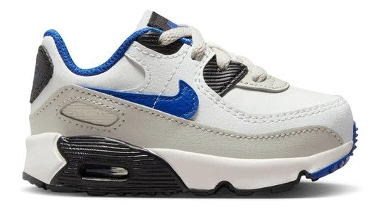 Toddler white low-top sneakers with blue swoosh and black air sole