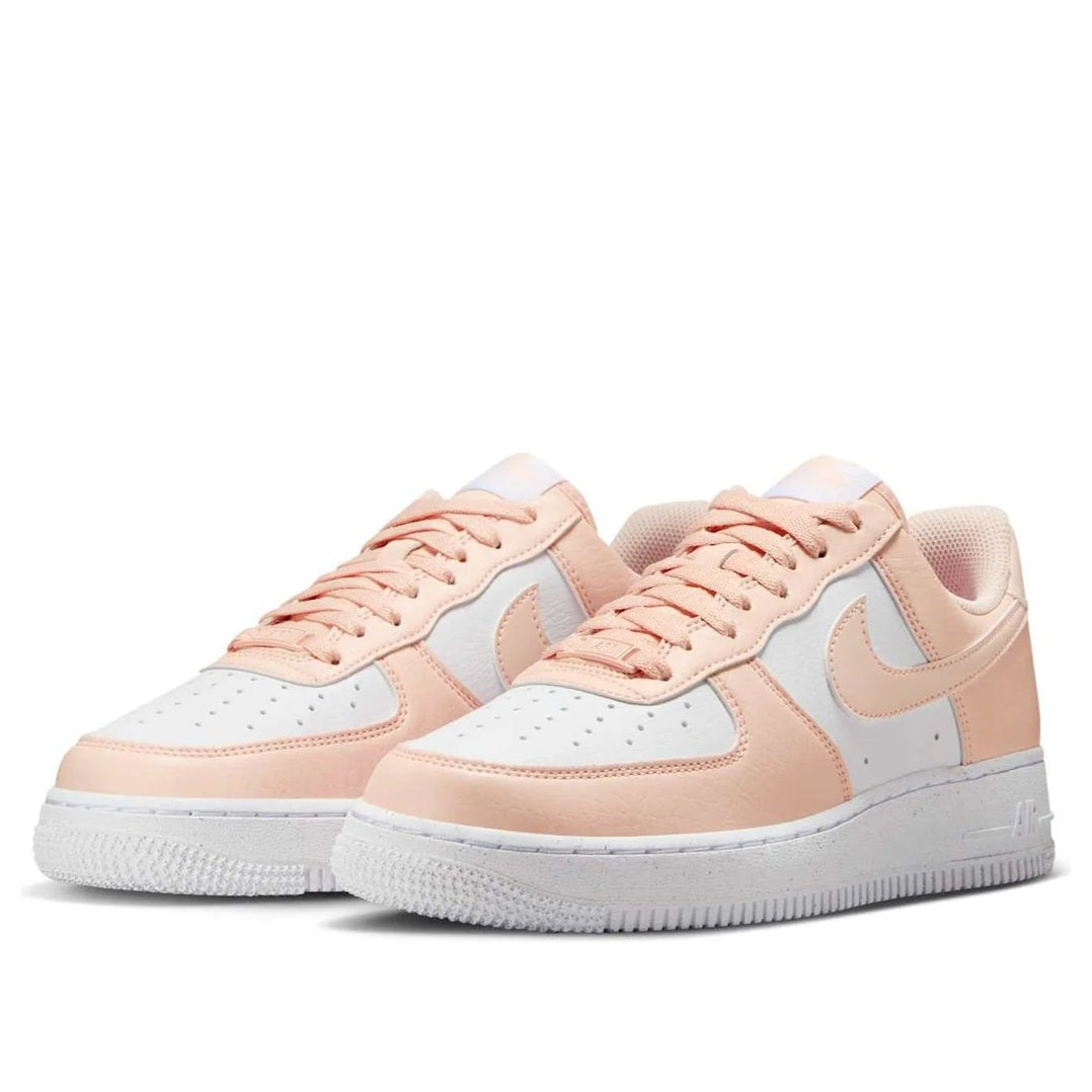 Pair of Women's Nike Air Force 1 sneakers, pale peach and light blue