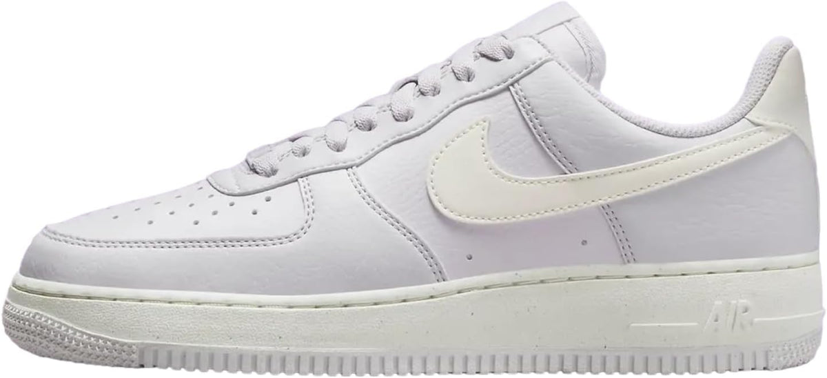 Nike Air Force 1 low-top sneakers, light upper with cream swoosh and lace-up