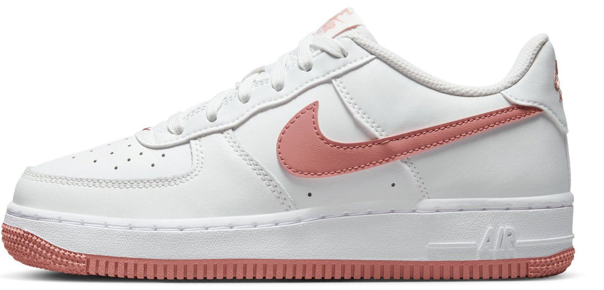 Kids' Nike low-top sneakers, white with pink/red swoosh and lace-up front