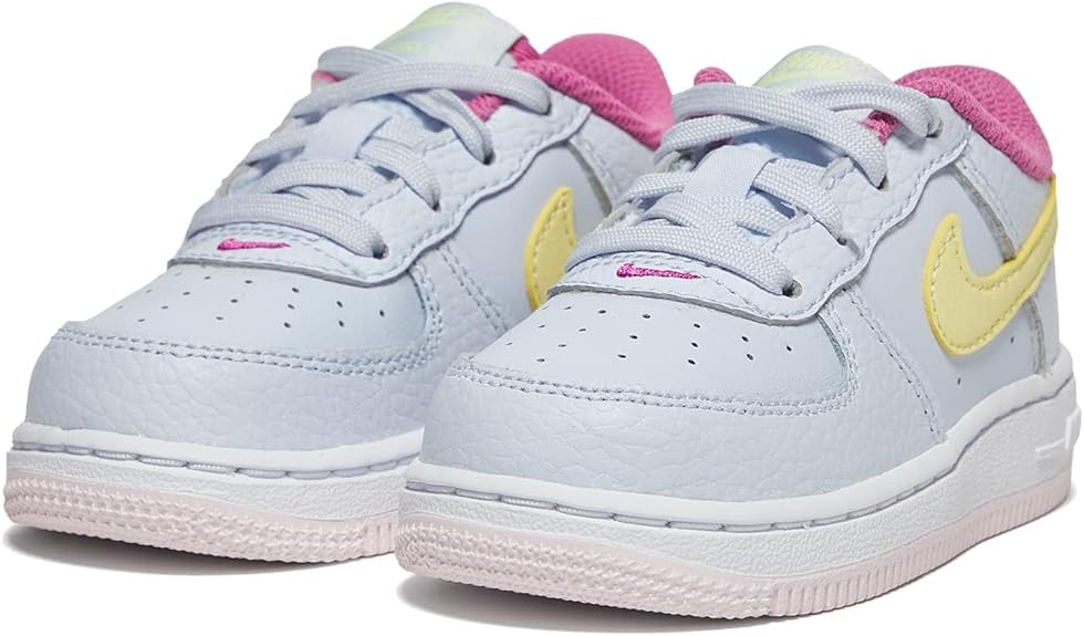 Toddler Nike sneakers in light grey with pink heel and yellow swoosh detail