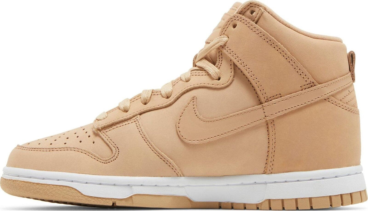 Women's tan high-top Nike Dunk sneakers, side Swoosh and lace-up closure