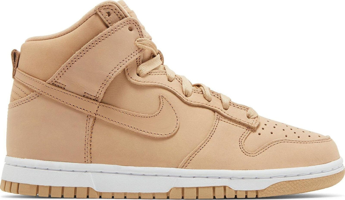 Women's tan high-top Nike Dunk sneakers in leather, lace-up with padded collar
