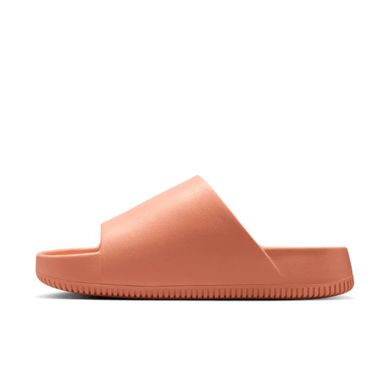 Apricot slide sandals with wide band upper, cushioned footbed, and textured outsole