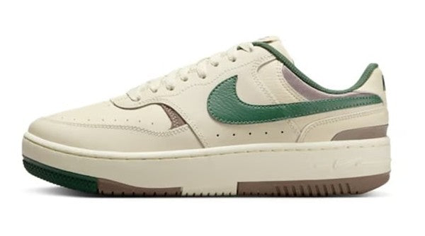 Women's Nike low-top sneakers in cream with green swoosh and brown sole