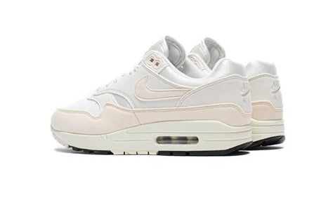 Women's Nike Air Max 1 sneakers, side view, sail leather with Swoosh and air-cushion sole