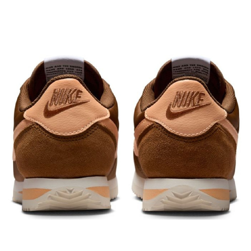 Women's Nike Cortez LT sneakers, brown suede-look backs with NIKE logo heel tabs.