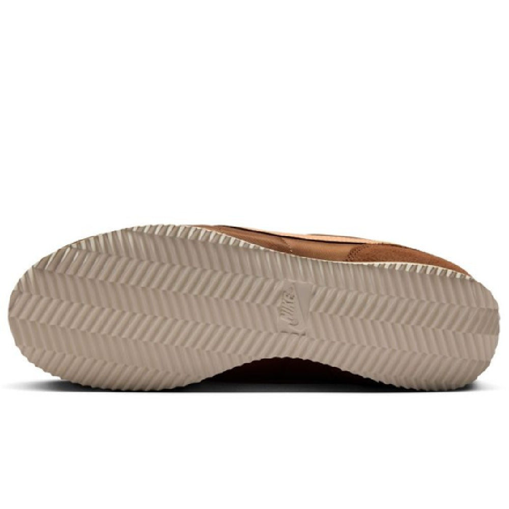 Nike Cortez LT rubber outsole with textured tread and beige midsole edge.