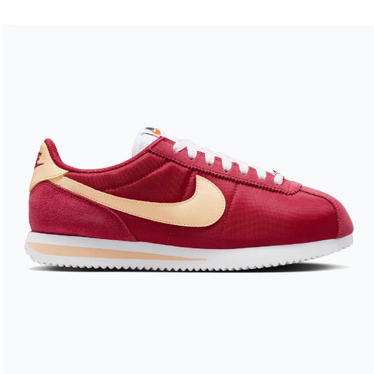 Women's red suede Cortez sneakers with cream swoosh and white laces