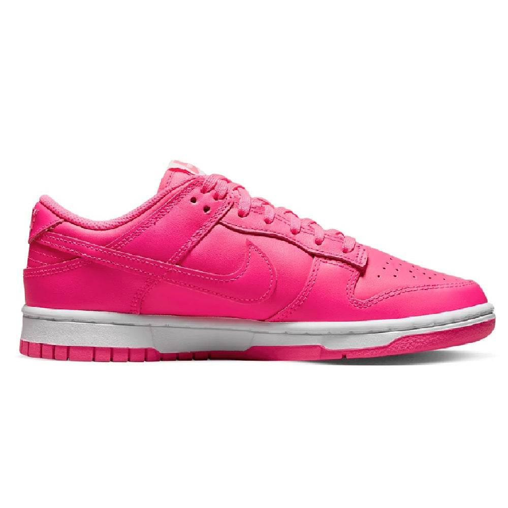 Nike Dunk Low low-top sneakers, side view, bright pink leather with swoosh and laces