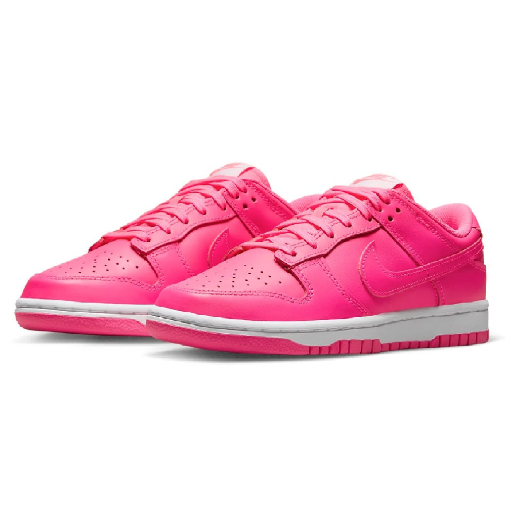 Nike Dunk Low low-top sneakers, pair angled view, bright pink leather uppers