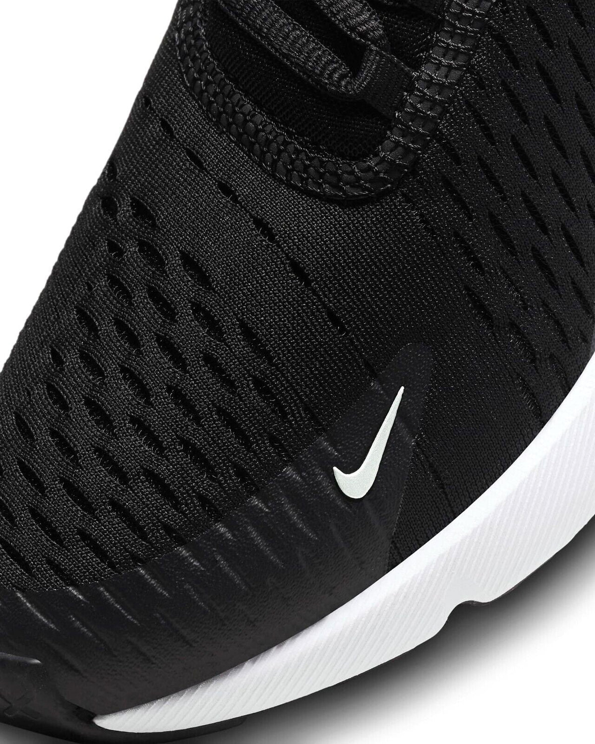 Nike Air Max 270 black knit upper close-up with white Swoosh and textured toe