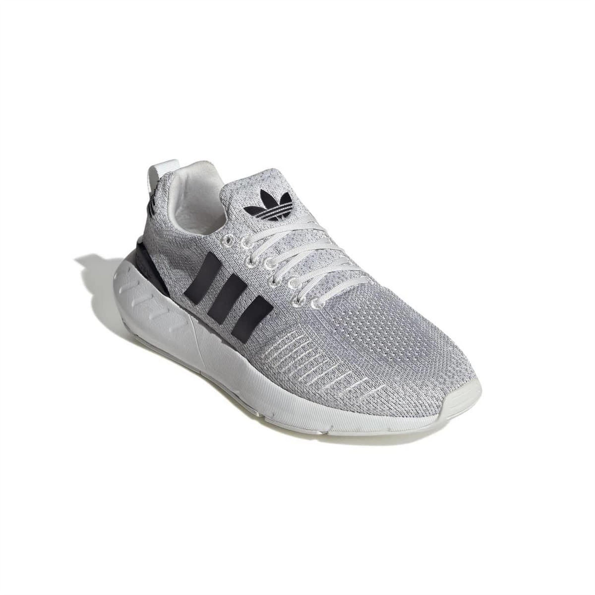 Silver-grey adidas trainers with black heel panel, white outsole, and lace-up design.