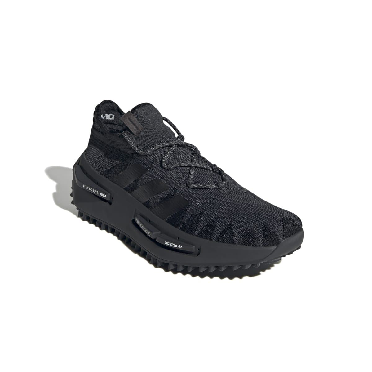 adidas NMD_S1 knit trainers in black, side view with lace-up closure and tread sole