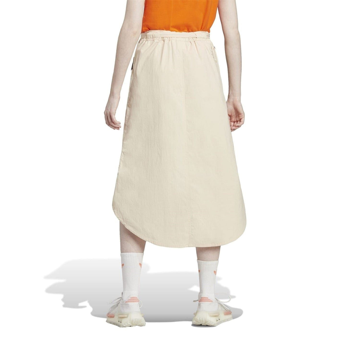 Light beige adidas Originals midi shorts with elastic waistband