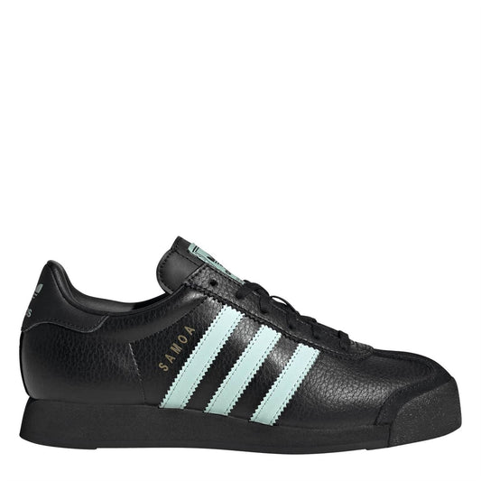 Black low-top sneakers with mint three-stripe side and lace-up front