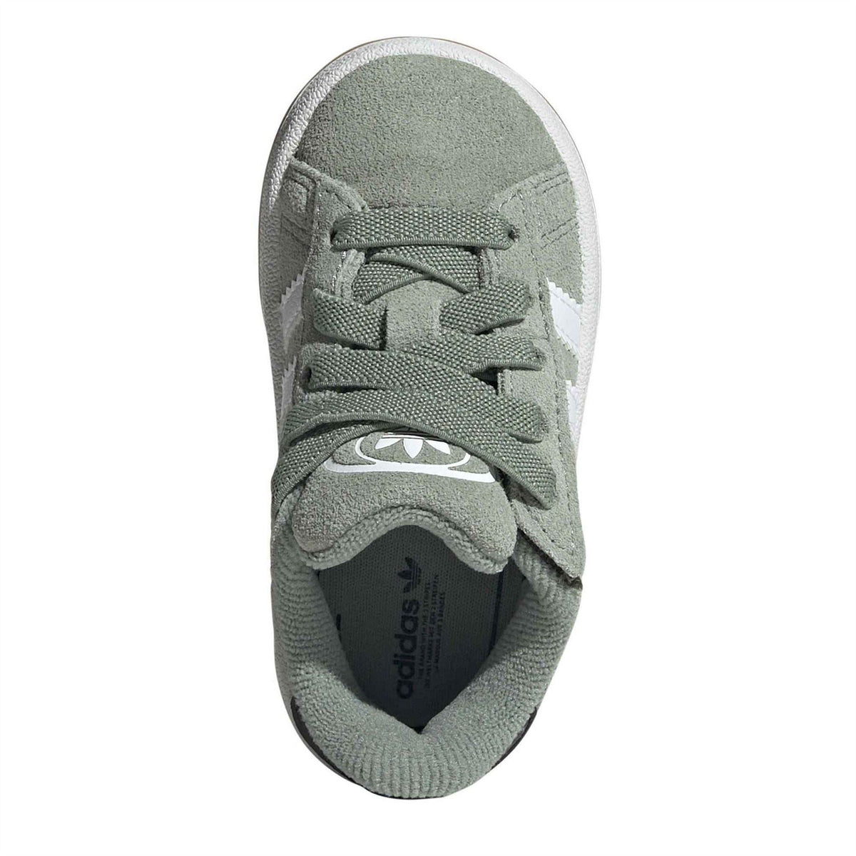 Infant crib sneaker with sage green canvas lining, lace-up top, and adidas logo on tongue