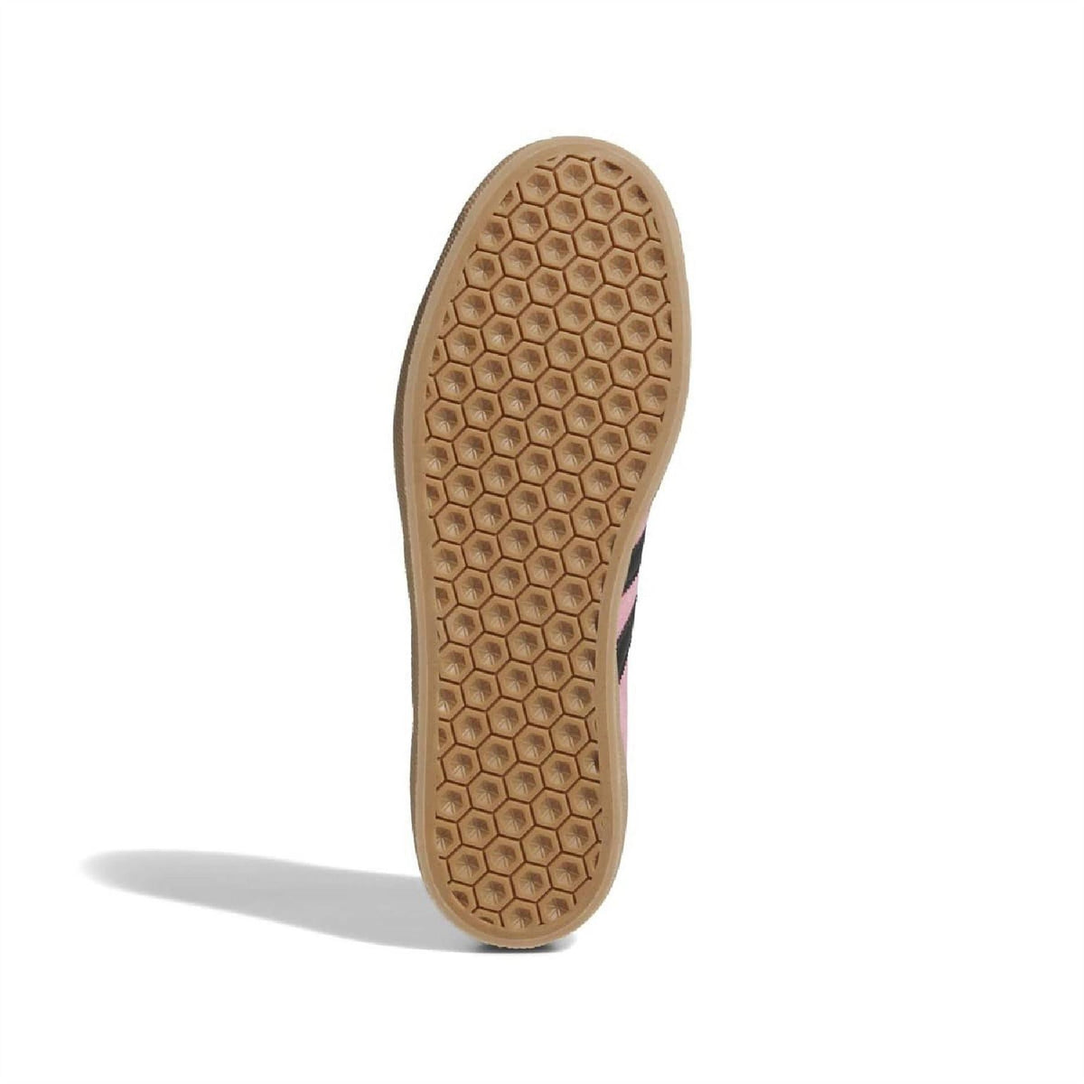 Hex-pattern gum rubber outsole of light pink trainers with black side stripe