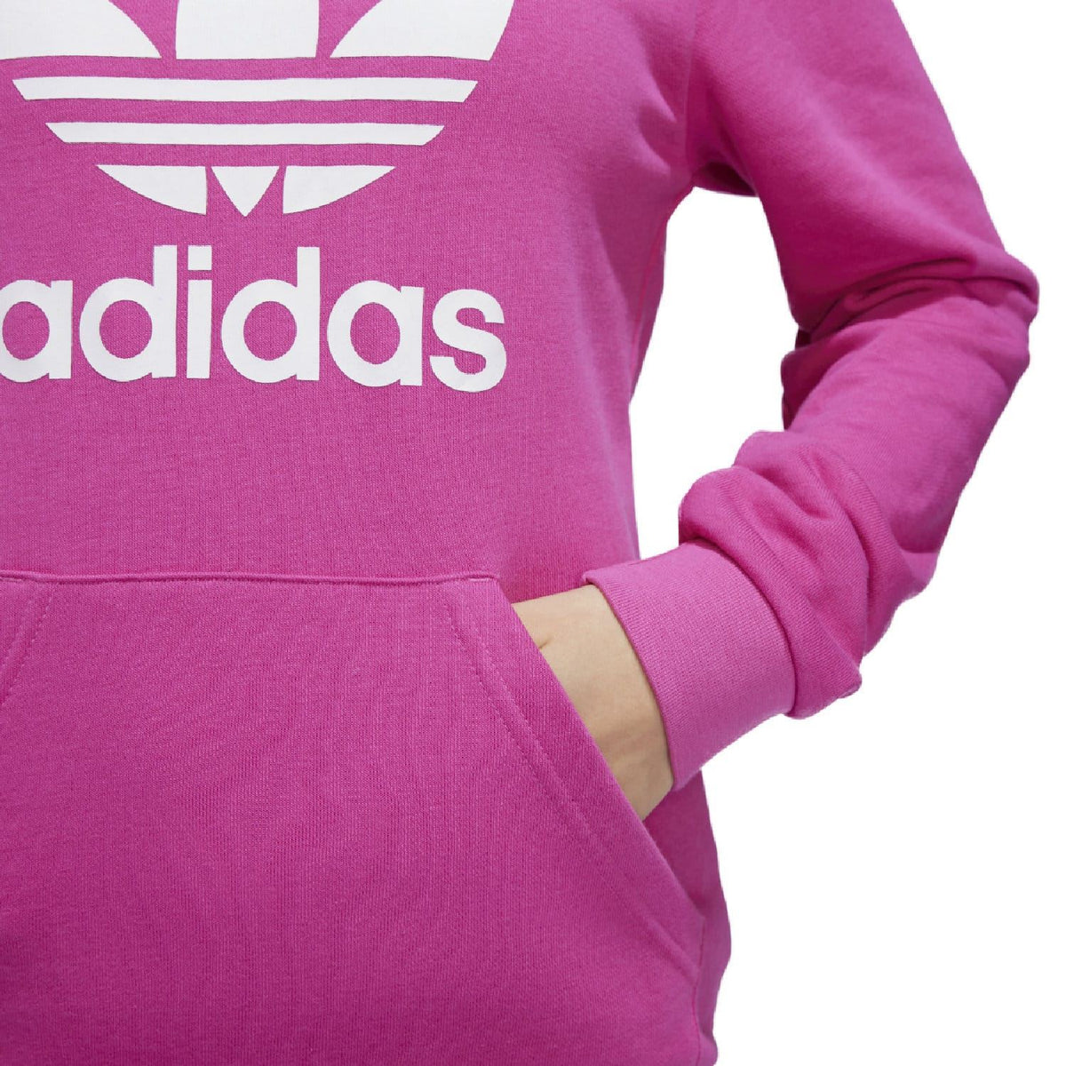 Pink junior trefoil hoodie sleeve and kangaroo pocket, adidas logo partly visible