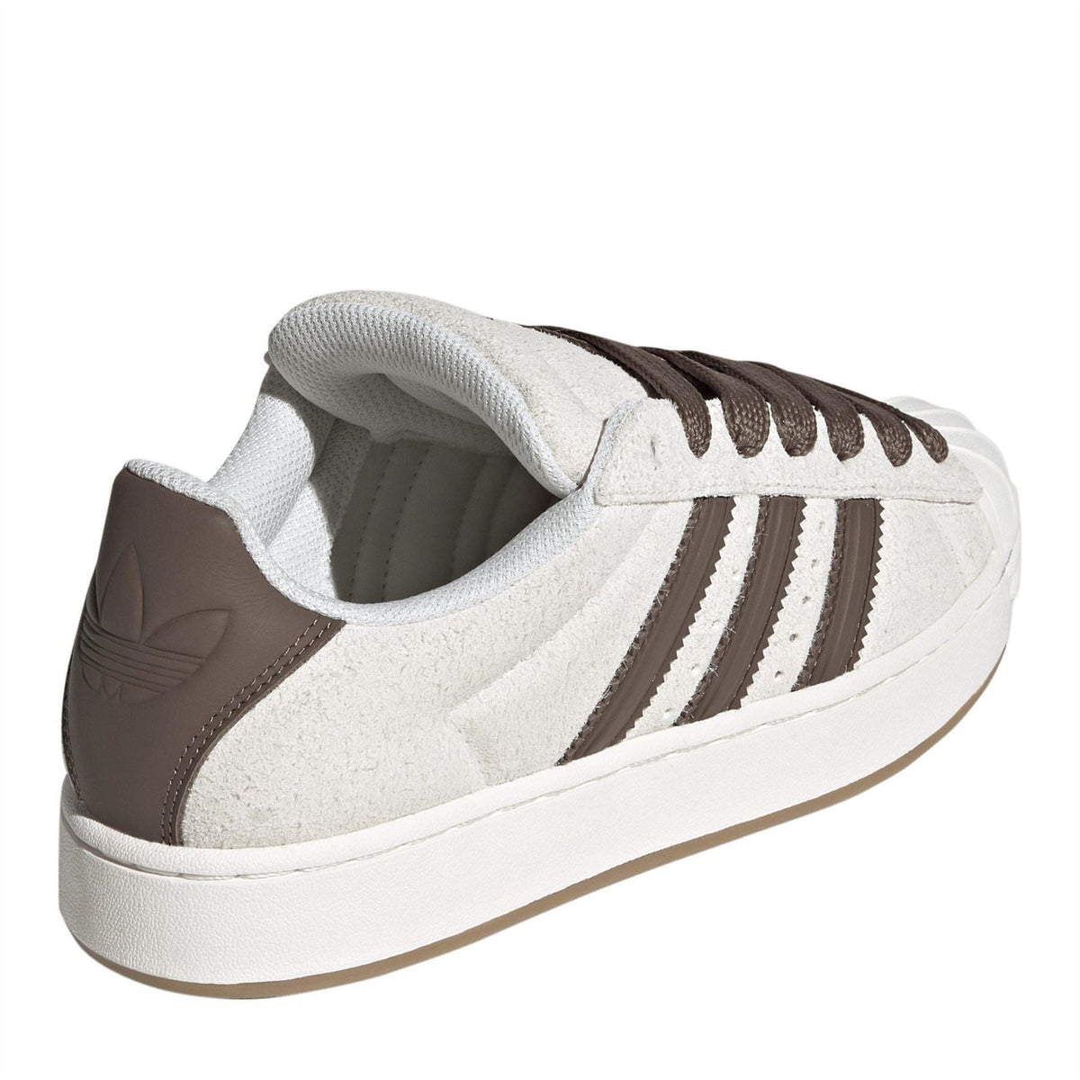 Off-white sneakers with brown heel panel and cushioned collar, white rubber midsole.