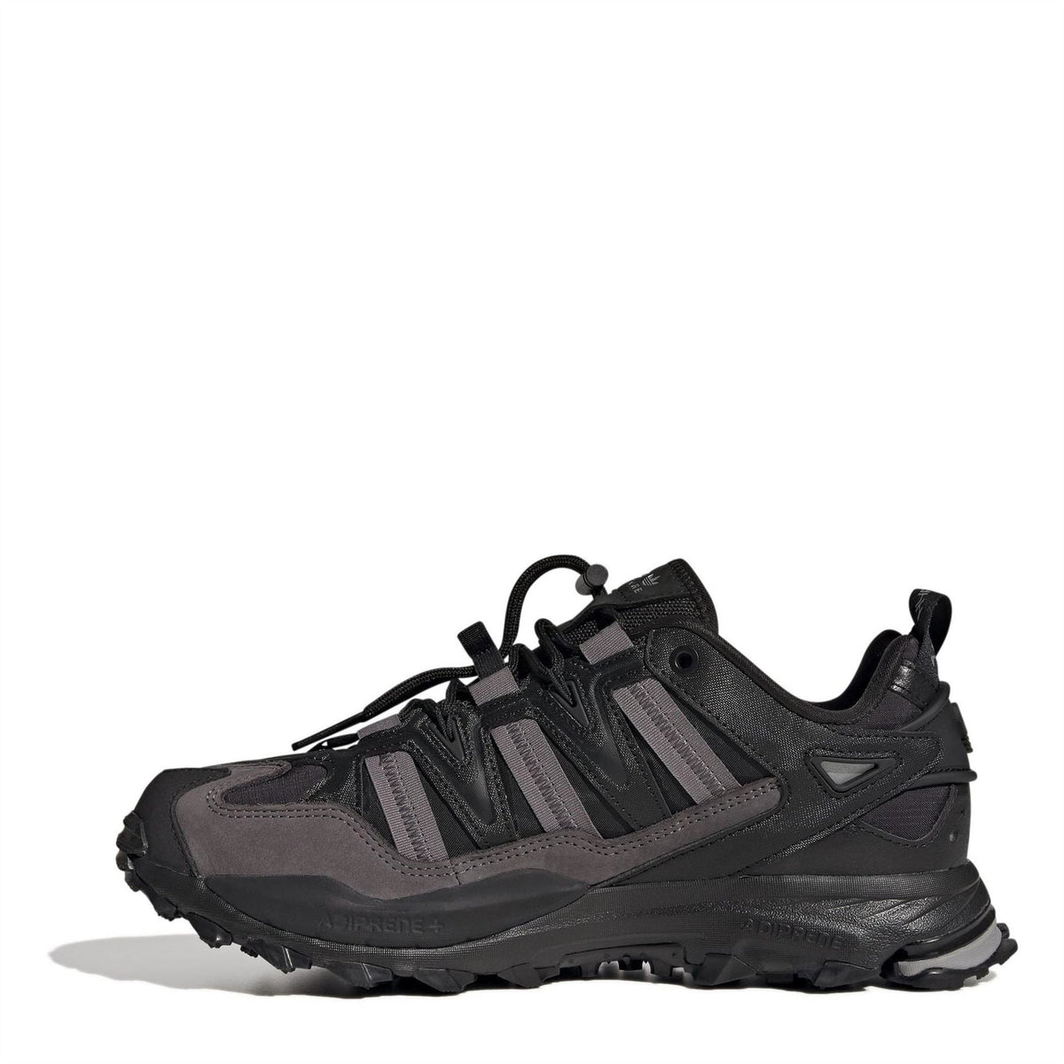 Black adidas lace-up sneaker with geometric strap overlays and cushioned sole.