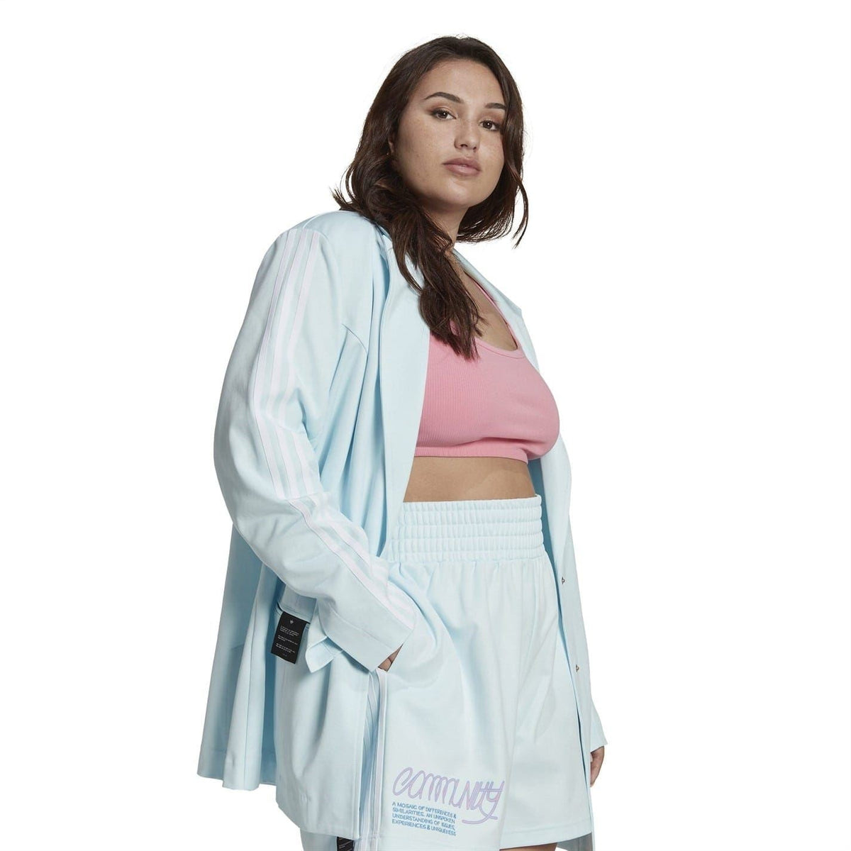adidas Originals women's blazer coat with a sleek design, featuring a classic fit and stylish details on the front.
