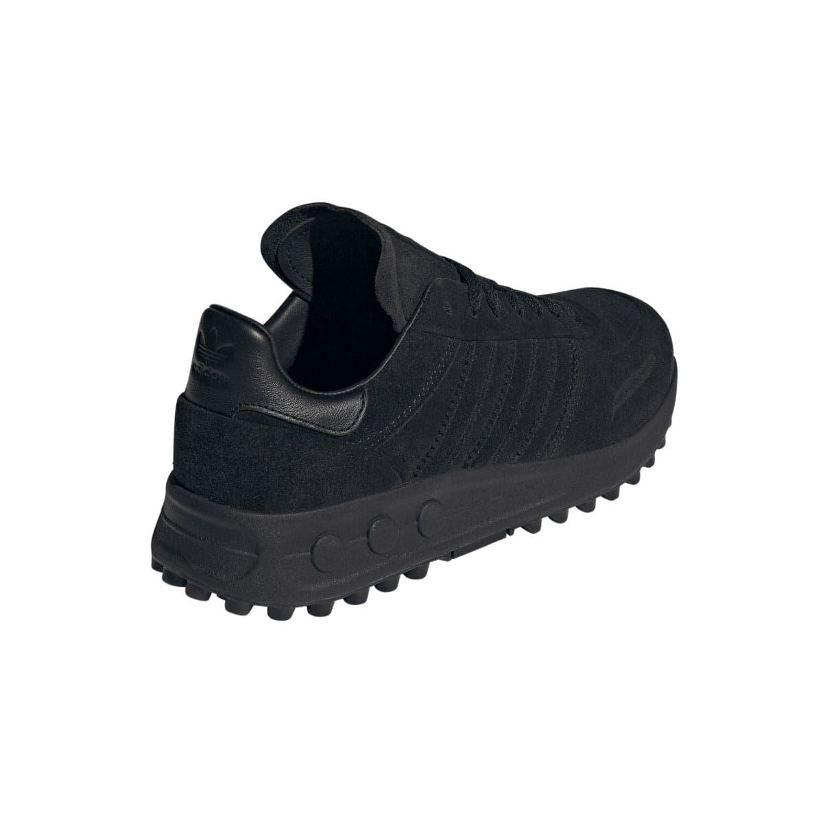 adidas Originals LA Trainer XLG athletic trainers featuring black and white design, breathable mesh upper, and supportive rubber sole.