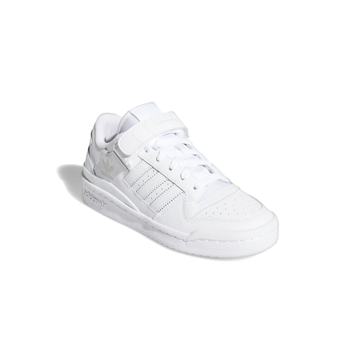White kids low-top trainer angled view with lace-up and adidas logo detail