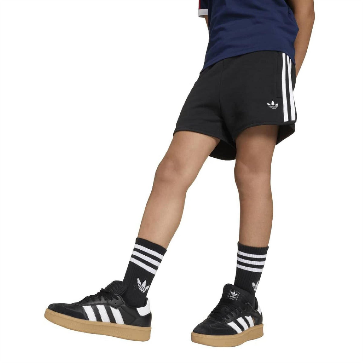 Black shorts with white side stripes and logo on leg; kids athletic style