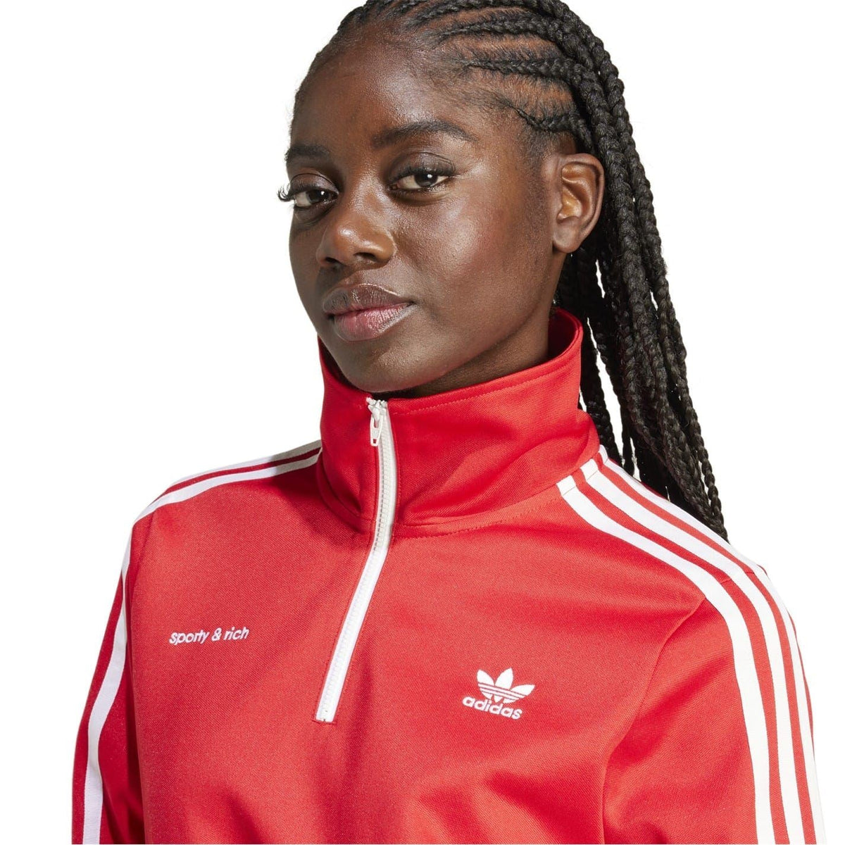 College red zip-neck top with adidas logo, white triple sleeve stripes, and front zipper.
