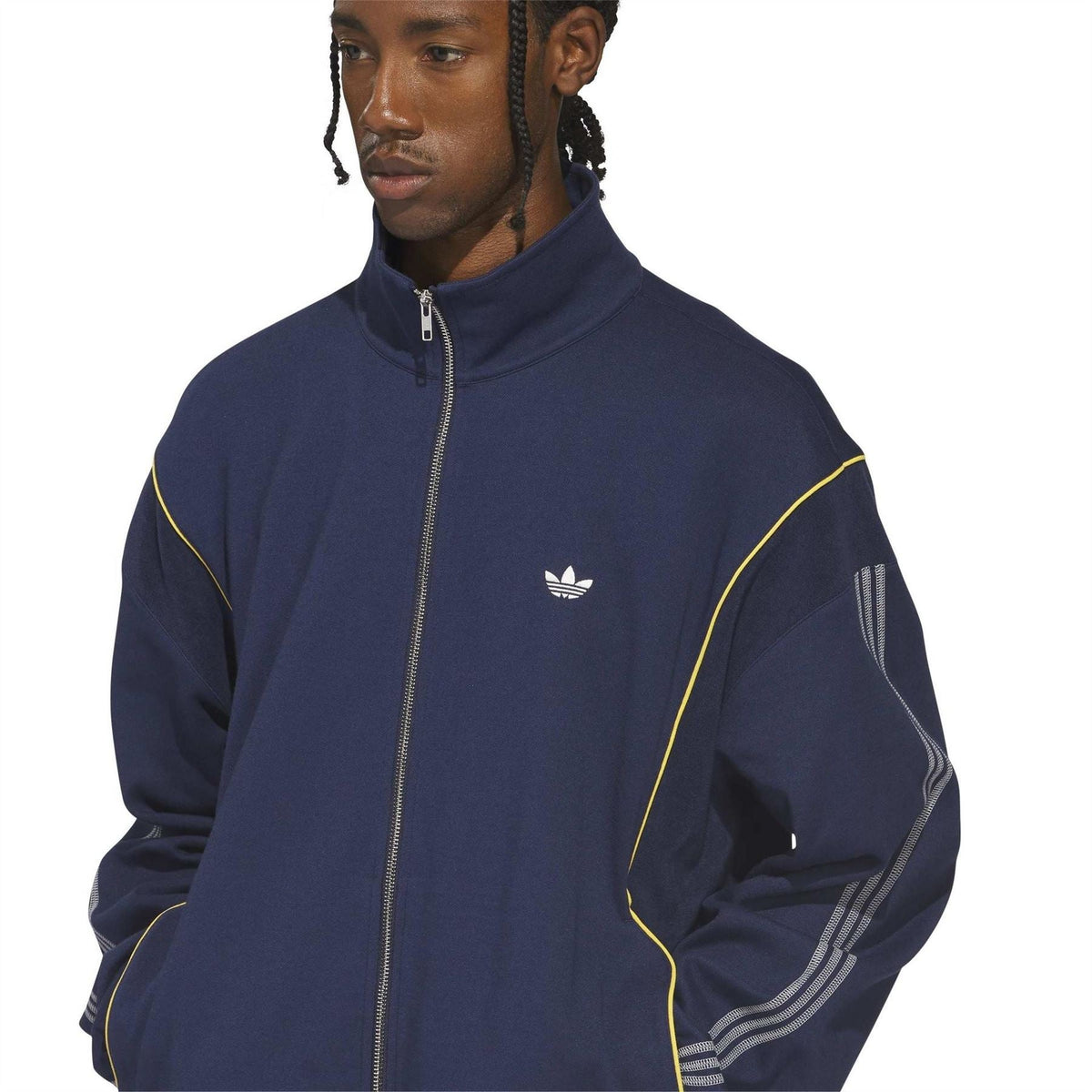 adidas Originals track jacket dark blue close-up with zip front, chest logo, yellow-trim lines