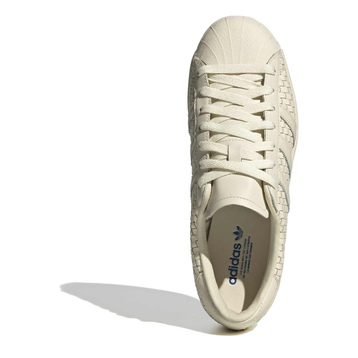 adidas Originals low top sneakers, cream lace-up with textured sidewall