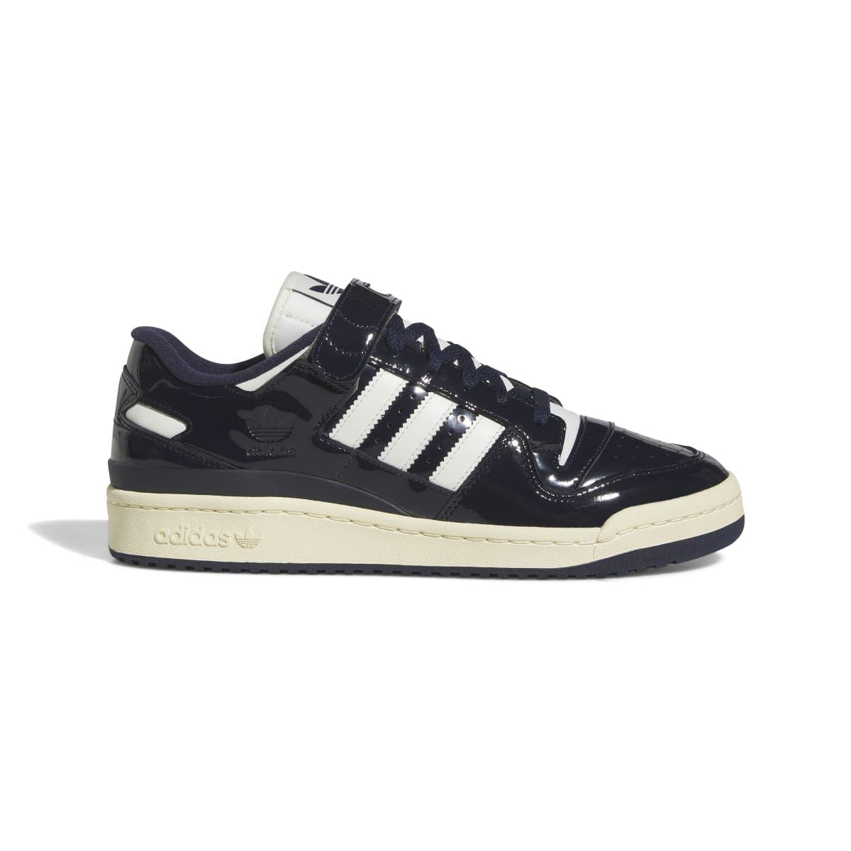 adidas low-top trainers in dark navy with white triple stripes and off-white sole