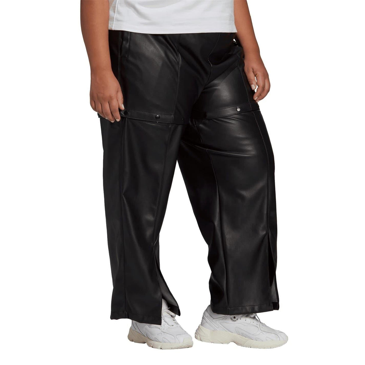 Black adidas Originals track pants with cargo pockets and wide straight legs